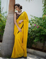 RADIANT YELLOW FAUX GEORGETTE SAREE WITH BUTTI WORK AND LACE BORDER