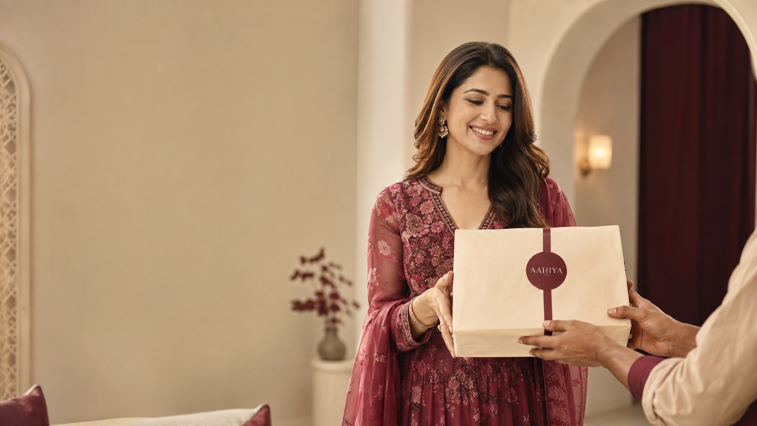 Customer confidently receiving a prepaid fashion order from Aahiya