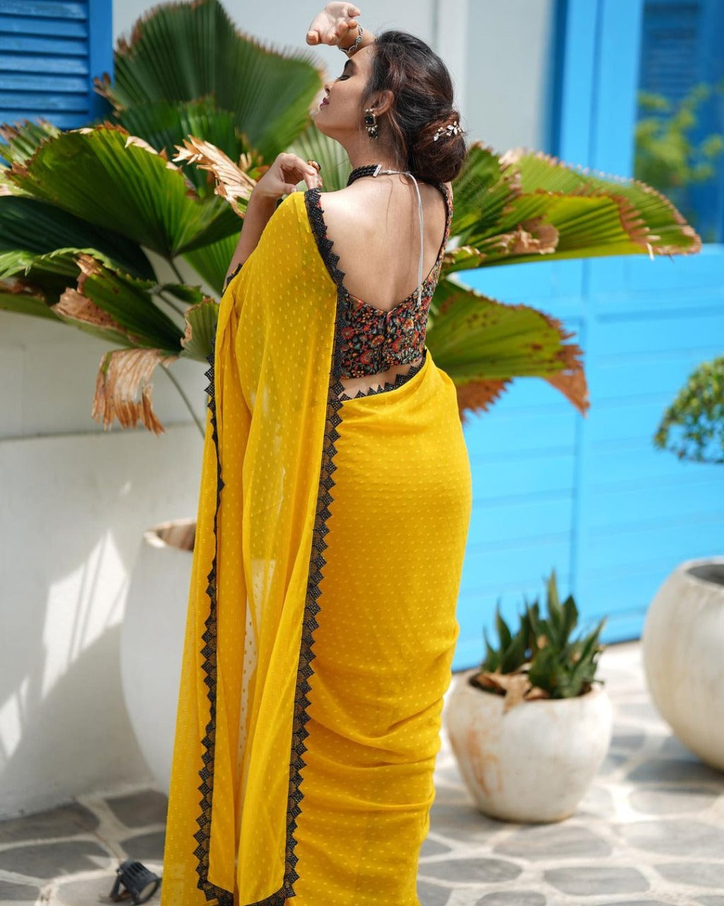 RADIANT YELLOW FAUX GEORGETTE SAREE WITH BUTTI WORK AND LACE BORDER