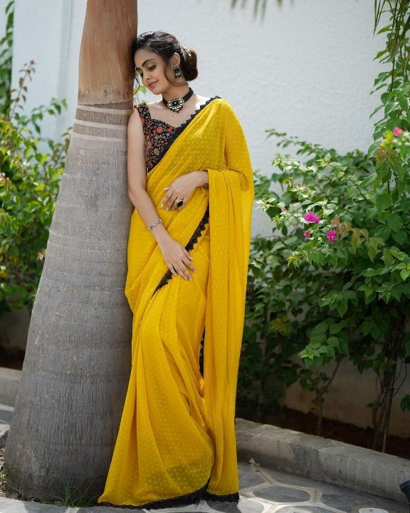 RADIANT YELLOW FAUX GEORGETTE SAREE WITH BUTTI WORK AND LACE BORDER